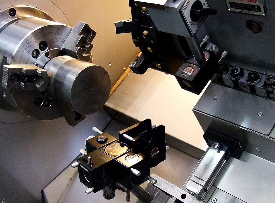 Pomiary dokładności pozycjonowania osi X tokarki odchylonej od poziomu